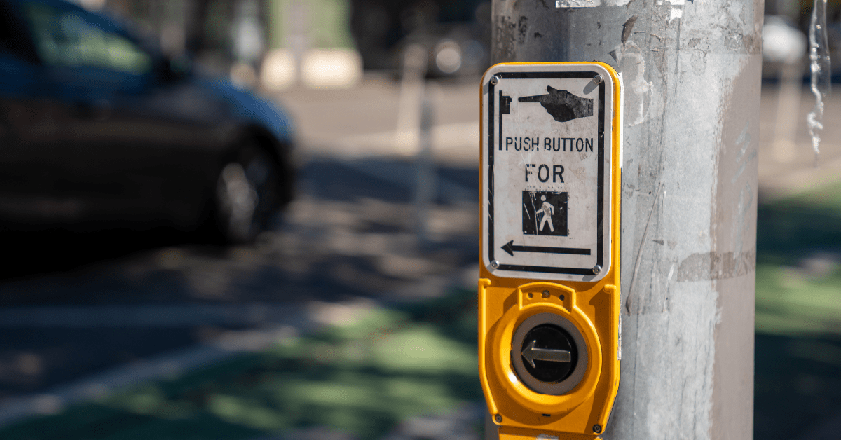 Button before crossing street